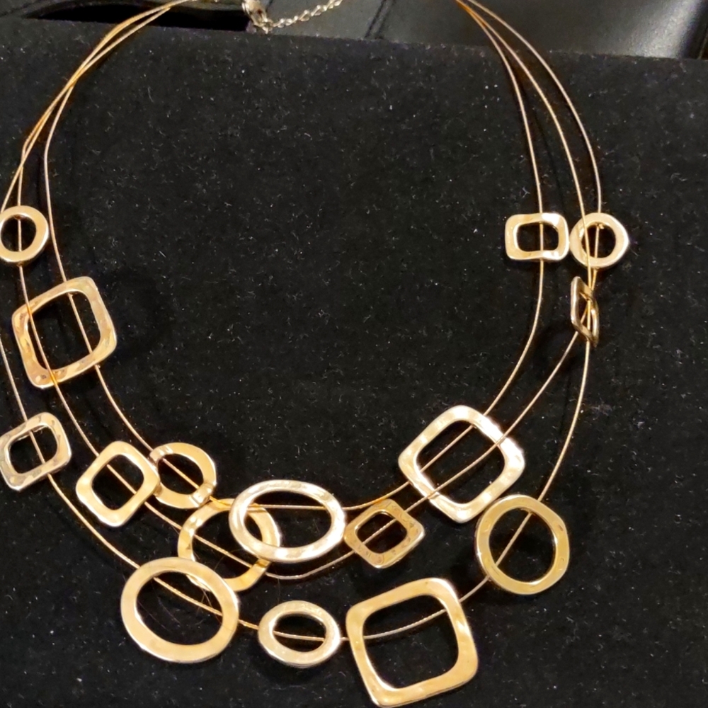 SALE WAS $21 NOW $13 GOLD TONED NECKLACE  WITH DIFFERENT SHAPED  STATIONS